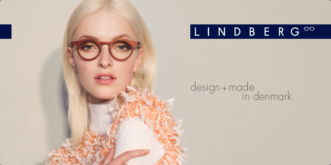 Beautiful model wearing luxury round wooden handmade in Denmark frames.